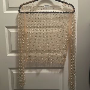Lime Lush’s “Nude Pearl and Rhinestone Detail Sheer Mesh Top”